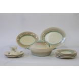 A Part Susie Cooper Dinner Service. Comprising a Tureen and Cover, two small serving platters, and