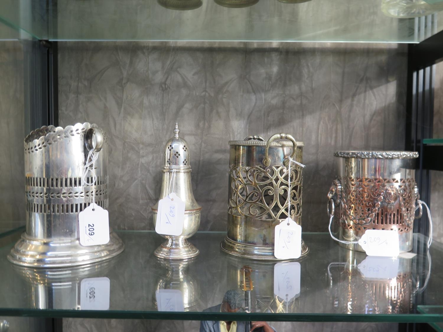 Three silver plated syphon-stands and a sugar castor (4)