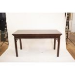 A Fine Irish Mahogany Serving Table. Circa 1760. Of rectangular form with slide fitted to one end.