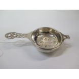 A Sterling Silver Tea Strainer on Stand. Makers mark AEN. Sheffield 1948. Of typical form. 6cm