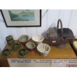 Four jelly moulds, Portmerion Totem pattern jar with three cups and saucers and a copper coal bucket