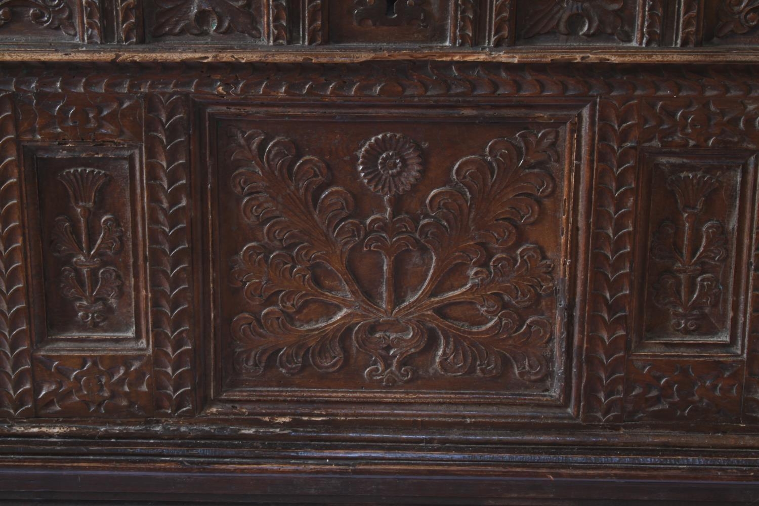 An Italian Oak Coffer. Possibly 16th century. The façade carved with panels of flowering foliage - Image 2 of 2