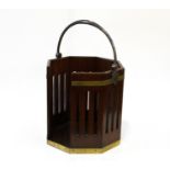 A George III Brass Bound Mahogany Plate Bucket. Circa 1790. With swing handle and openwork sides.