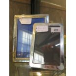 Two silver plated picture frames 21cm and 18cm tall (2)