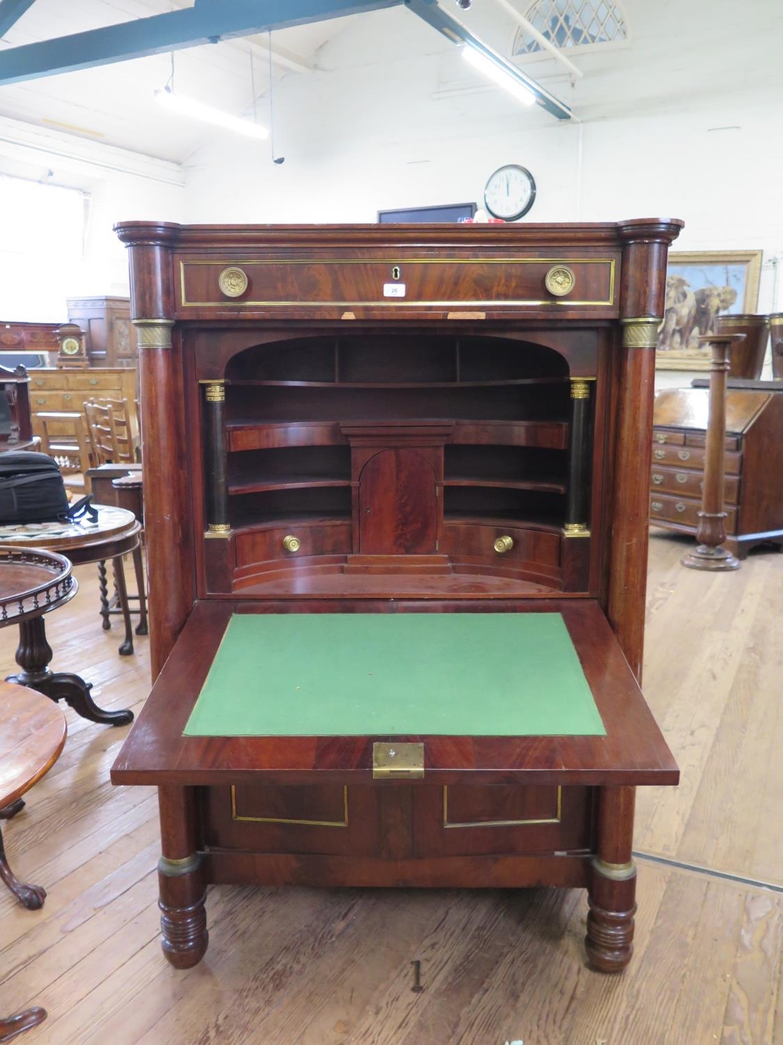 A French First Empire Secretaire a'abattant . The fall front opening to reveal interior flanked by