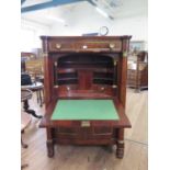 A French First Empire Secretaire a'abattant . The fall front opening to reveal interior flanked by