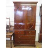 A Fine Hepplewhite Style Hanging Closet. Circa 1770. With stepped cornice above a pair of panel