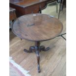 A Fine Irish 18th Century Mahogany Wine Table. Circa 1760. The circular top with moulded rim. On
