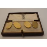 A pair of 9 carat gold oval cufflinks in case, 10.36g