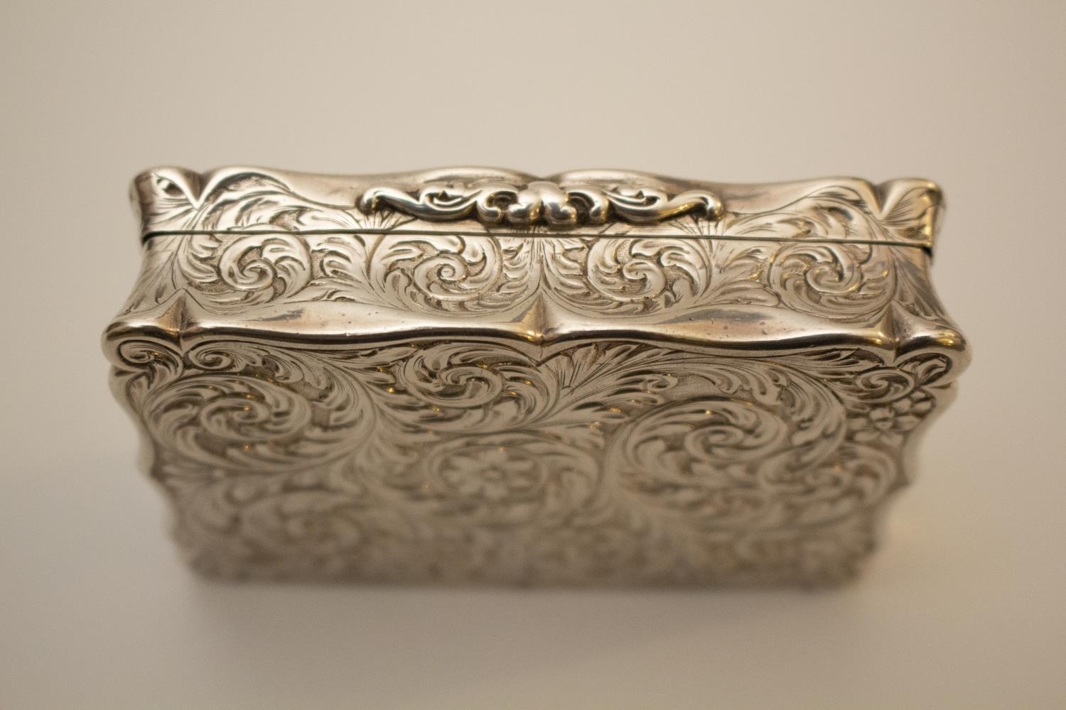 A George IV Sterling Silver Table Snuff Box. Edward Smith. Birmingham 1829. Embossed with figures in - Image 4 of 4