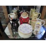 Collection of pub jugs and other pub memorabilia