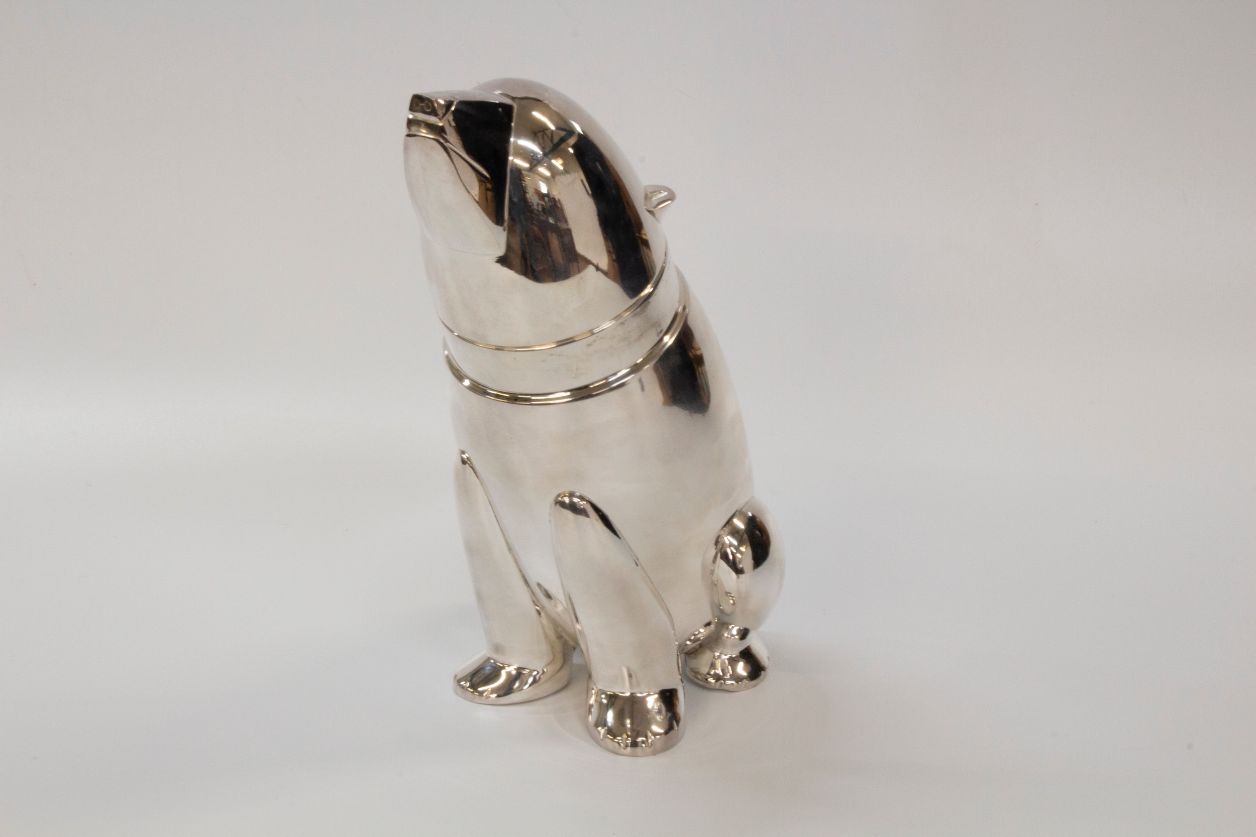 A Novelty Cocktail Shaker. 20th century. In the form of a Polar Bear .27cm high