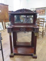 A Regency Mahogany Mirrored Chiffonier. Circa 1815. With a leaf carved frieze above lions paw scroll