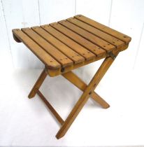 A 1970's wooden artist's stool, folding and collapsable, MF Brevettato impressed maker's mark to