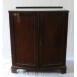 An Unusual Late Victorian Mahogany Press Cupboard. Circa 1890. With a pair of doors opening to