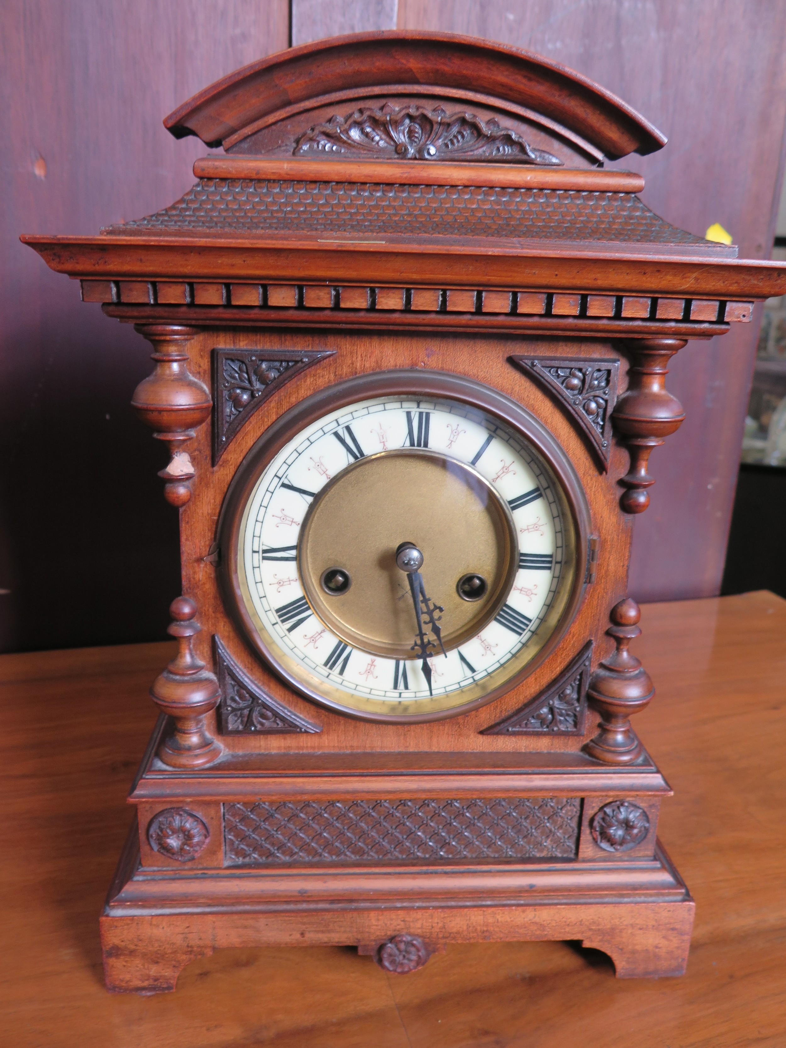 A Late Victorian Oak Cased Mantel Clock, with key