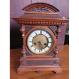 A Late Victorian Oak Cased Mantel Clock, with key