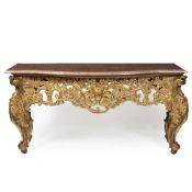 A 20TH CENTURY BOW FRONTED MARBLE TOPPED CARVED GILTWOOD SIDE TABLE with scrolling cabriole legs,