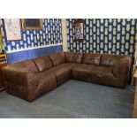 A MODERN BROWN LEATHER CORNER SOFA 260cm across both backs x 98cm deep x 74cm high Condition: