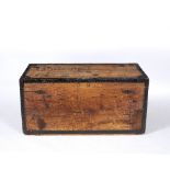 A 19TH CENTURY TIN LINED TRAVELLING TRUNK with metal bound corners and a label for 'W J Lovelace &