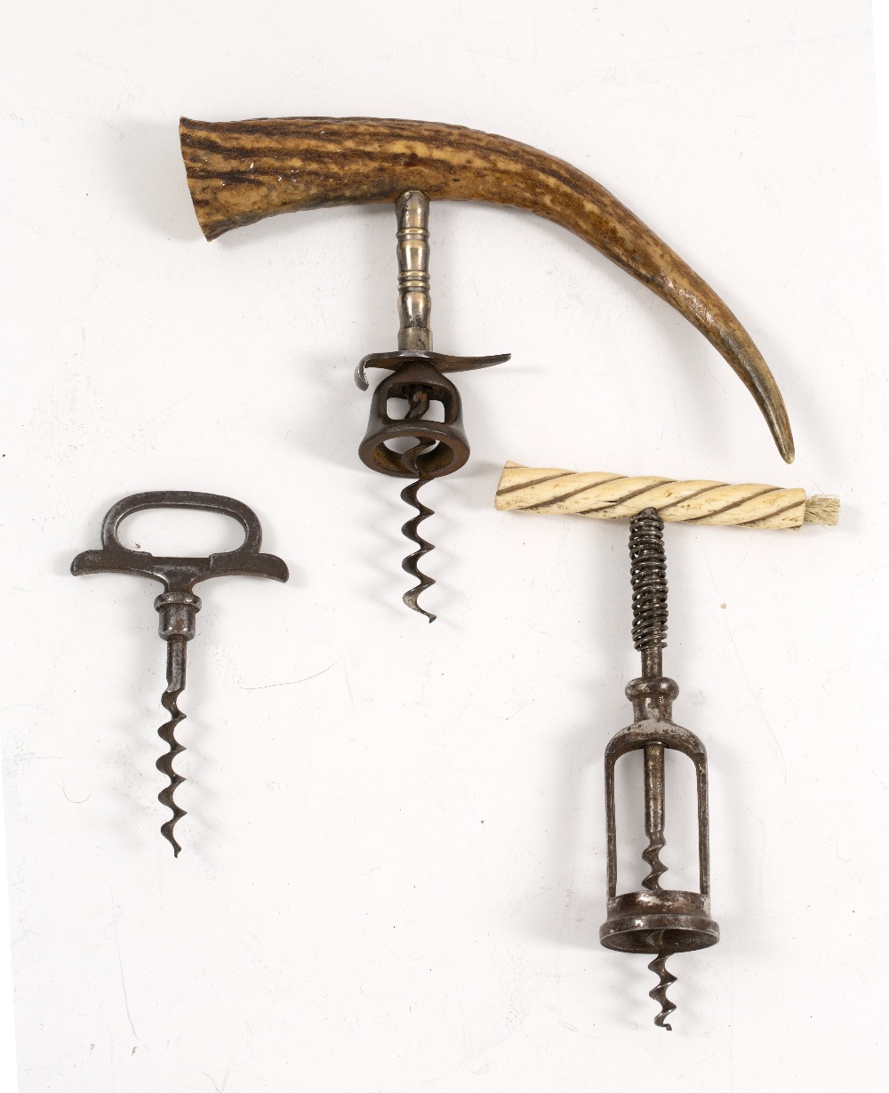 AN ANTIQUE IVORY HANDLED CORKSCREW 16cm in length; an antler handled corkscrew and a further antique - Image 2 of 2