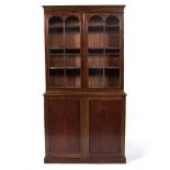 A 19TH CENTURY MAHOGANY BOOKCASE CABINET the glazed upper section enclosing adjustable shelves