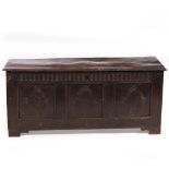 AN EARLY 18TH CENTURY OAK COFFER 128cm wide x 44cm deep x 56cm high Condition: later handles to