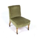 A 19TH CENTURY GILT GESSO LEGGED GREEN DRAYLON UPHOLSTERED LOW OCCASIONAL CHAIR with bowed front,