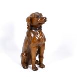 A CARVED WOODEN MODEL OF A SEATED DOG with a leather collar, 63cm in height Condition: a chip to one