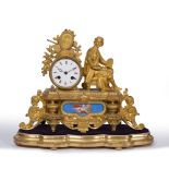 A 19TH CENTURY FRENCH GILT METAL MANTLE CLOCK with an inset painted porcelain panel and enamelled