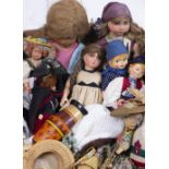 A COLLECTION OF DOLLS At present, there is no condition report prepared for this lot This in no
