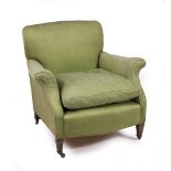 A LATE 19TH / EARLY 20TH CENTURY GREEN UPHOLSTERED EASY ARMCHAIR with square tapering front legs and