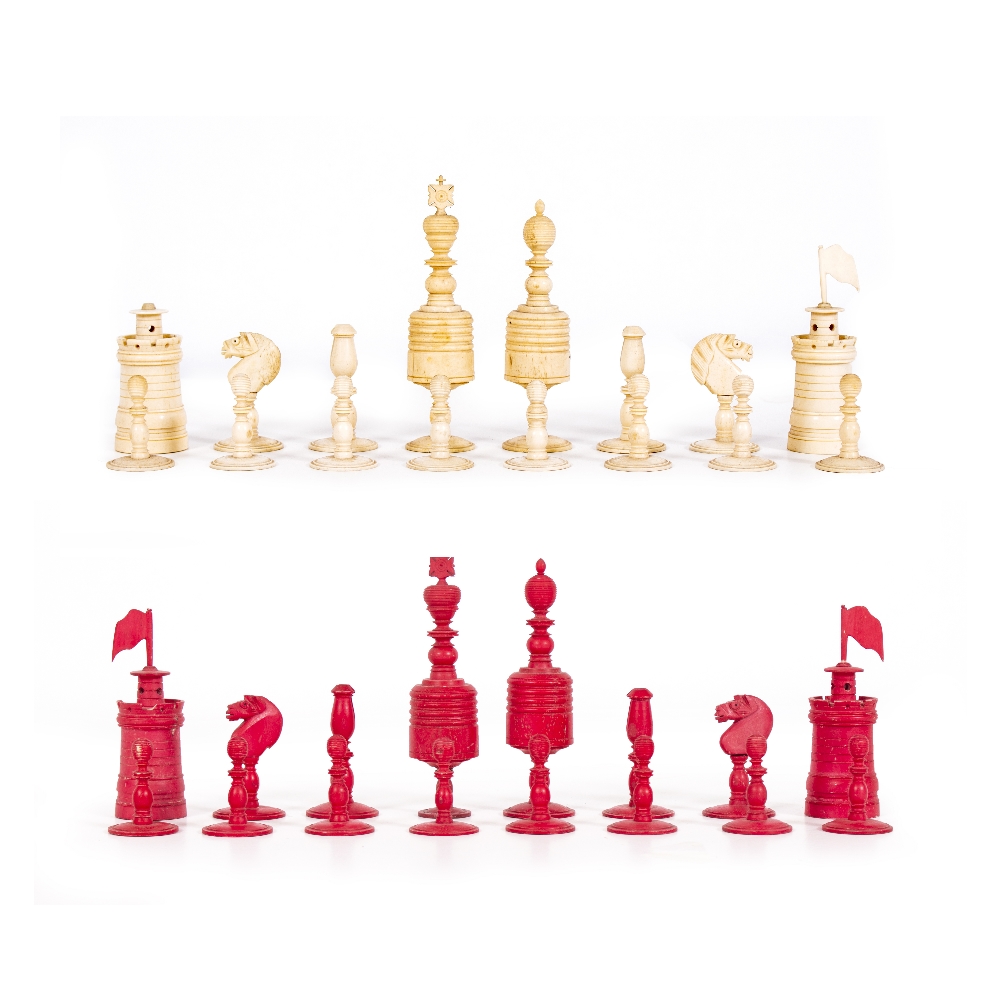 A 19TH CENTURY TURNED BONE CHESS SET the kings 14.5cm high Condition: some minor marks and losses,