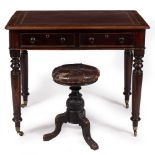 A VICTORIAN MAHOGANY WRITING TABLE with a later maroon leather inset top, two frieze drawers with