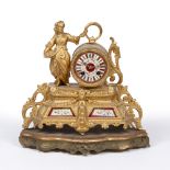 A 19TH CENTURY CONTINENTAL GOLD PAINTED SPELTER MANTLE CLOCK the dial and case set with flower