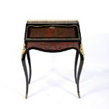 AN 18TH CENTURY STYLE BOULE WORK LADIES WRITING DESK on a tortoise shell ground, the fall front