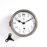 AN OLD SHIP'S WALL CLOCK the enamel dial with arabic numerals and subsidiary second hand, 20cm