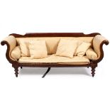 A 19TH CENTURY MAHOGANY FRAMED UPHOLSTERED HIGH BACKED SETTEE with scroll arms and turned