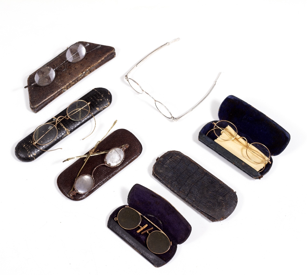 A SET OF 19TH CENTURY SILVER SPECTACLES with extending arms together with five further pairs of 19th