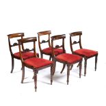 A SET OF FIVE REGENCY ROSEWOOD DINING CHAIRS with bar backs and inset seats, 46cm wide x 86cm high