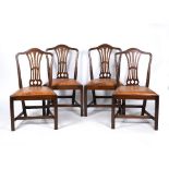 A SET OF FOUR MAHOGANY DINING CHAIRS with brown leather inset seats, 55cm wide x 94cm high