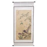 A MODERN CHINESE SCROLL PAINTING ON SILK depicting birds on a rocky outcrop with flowering prunus