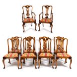 A SET OF TEN CHERRYWOOD GEORGIAN STYLE DINING CHAIRS with pierced splats and inset seats upholstered