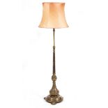 A VICTORIAN BRASS ADJUSTABLE LAMP STANDARD later converted for electric use with fluted column