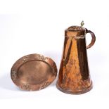 A LARGE COPPER AND BRASS ARTS AND CRAFTS FLAGON circa 1910, 46cm high and an art nouveau copper