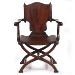 A 19TH CENTURY AND LATER MAHOGANY OPEN ARMCHAIR with a panelled back and seat with an X framed