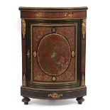 A 19TH CENTURY FRENCH EBONISED TORTOISE SHELL AND BRASS INLAID BOULLE CORNER CABINET with gilt