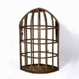 AN UNUSUAL GILDED WALL MIRROR of caged form, 60cm wide x 98cm high Condition: some losses to the