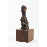 A 19TH CENTURY CURIOUS CARVED WOODEN FIGURE of a half man half animal seated astride another animal,