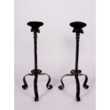 A PAIR OF 20TH CENTURY BLACK PAINTED WROUGHT IRON HAT STANDS with tripod bases, 57.5cm high